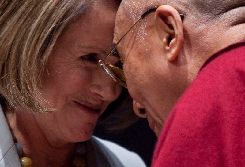 The Dalai Lama and Ms Pelosi in 2009. AP