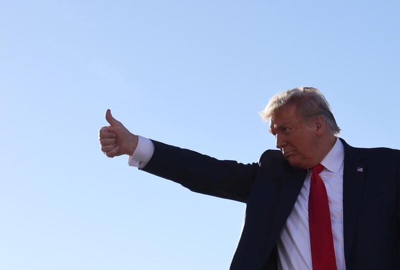 U.S. President Donald Trump gives a thumbs up during a campaign rally at Phoenix Goodyear Airport in Goodyear, Arizona, U.S., October 28, 2020. REUTERS/Jonathan Ernst TPX IMAGES OF THE DAY