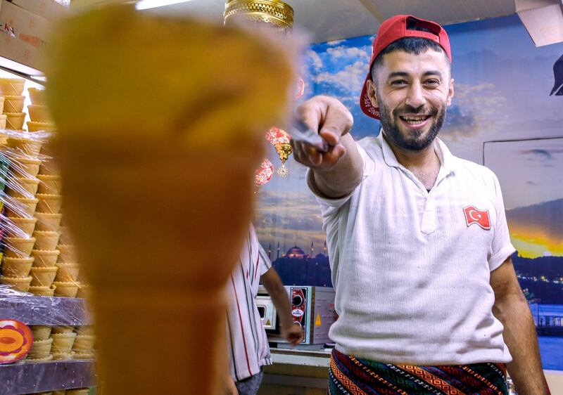Abu Dhabi, United Arab Emirates, January 5, 2020.  
--  Ali Kaci, 25, Turkey.  Has been serving Tutkish Ice Cream at the Global Village for four years now.
Photo essay of Global Village.
Victor Besa / The National
Section:  WK
Reporter:  Katy Gillett