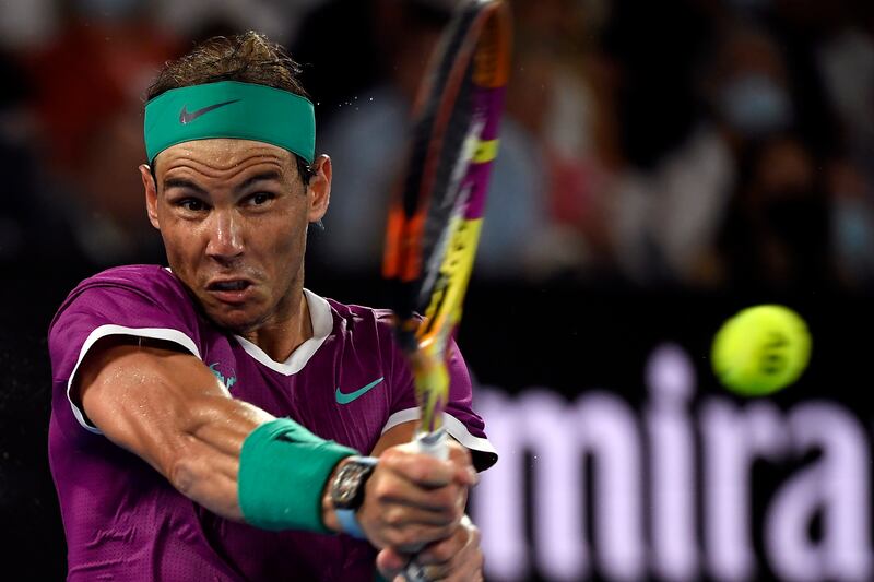 Rafael Nadal plays a backhand return. AP