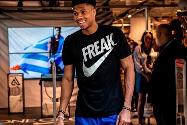 Milwaukee Bucks forward and NBA's Most Valuable Player for the 2018-2019 season Giannis Antetokounmpo leaves a Nike store after attending a promotional event. Nike's "Dream Crazier" campaign is an example of promoting values not products. AFP 
