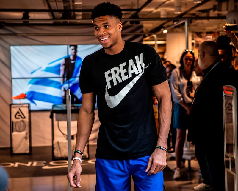 Milwaukee Bucks forward and NBA's Most Valuable Player for the 2018-2019 season Giannis Antetokounmpo leaves a Nike store after attending a promotional event, at the Syntagma square in Athens on June 28, 2019. Speaking at an event in Athens to promote his line of sports shoes, "Greek Freak" Giannis Antetokounmpo said on June 28, 2019 that he would play for Greece at the FIBA Basketball World Cup in China this summer. / AFP / ANGELOS TZORTZINIS
