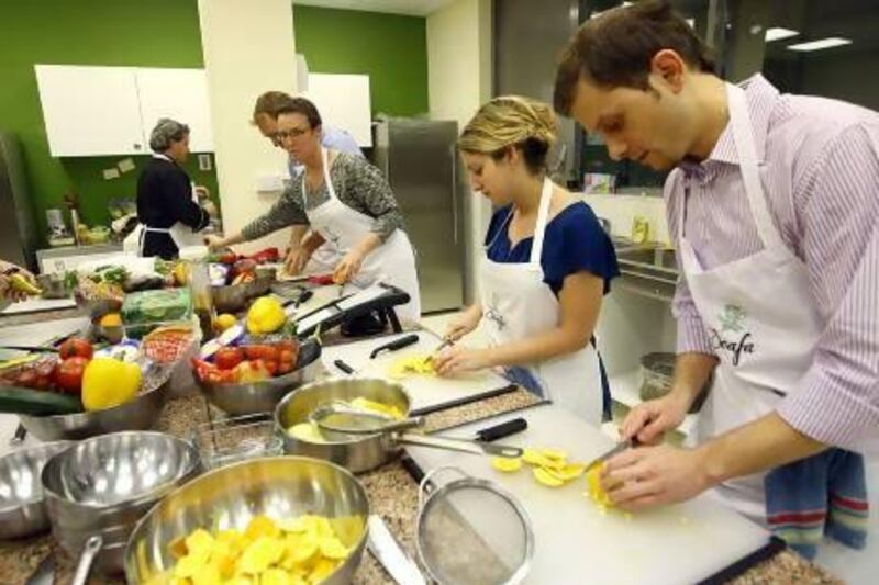 Dubai residents participate in the Healthy Eating Cookery class at School of Culinary and Finishing Arts (Scafa) in Dubai. Satish Kumar / The National