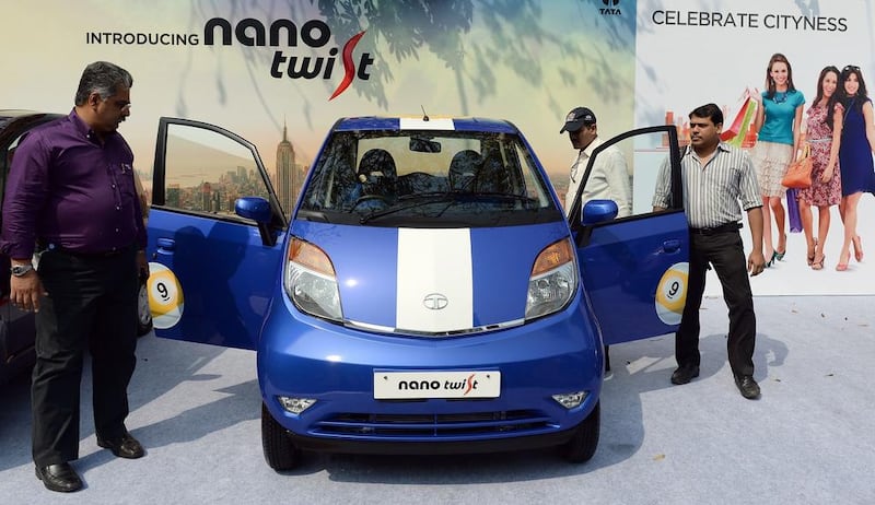 Visitors inspect the new Nano Twist during its launch on Monday. Indranil Mukherjee / AFP