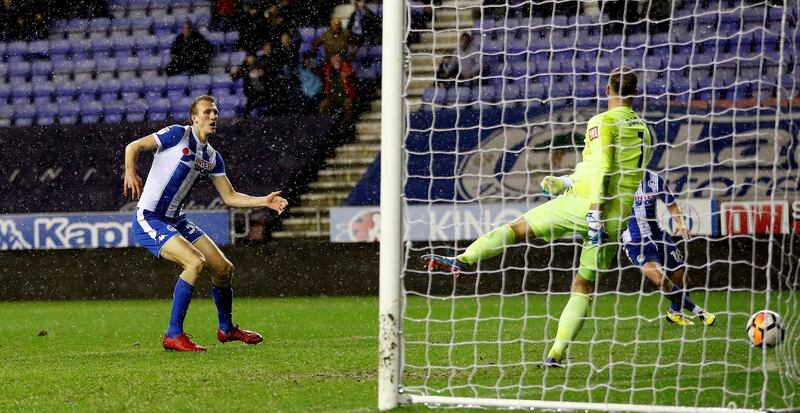 Centre-back: Dan Burn (Wigan Athletic). The giant defender helped prevent West Ham from recording a shot on target, let alone a goal, at the DW Stadium. Carl Recine / Reuters