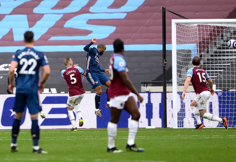 Arsenal's Alexandre Lacazette scores their side's third goal. PA