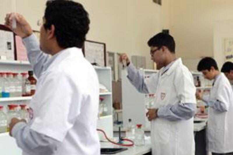 Chemistry students in a science laboratory at the Indian High School, which has been rated 'good' by the KHDA.