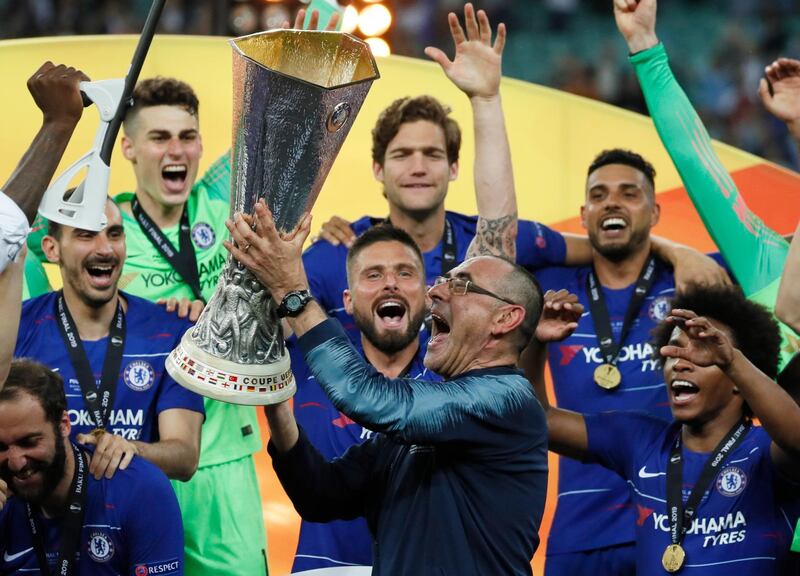 epa07611360 Chelsea's manager Maurizio Sarri lifts the trophy after winning the UEFA Europa League final between Chelsea FC and Arsenal FC at the Olympic Stadium in Baku, Azerbaijan, 30 May 2019.  EPA/YURI KOCHETKOV