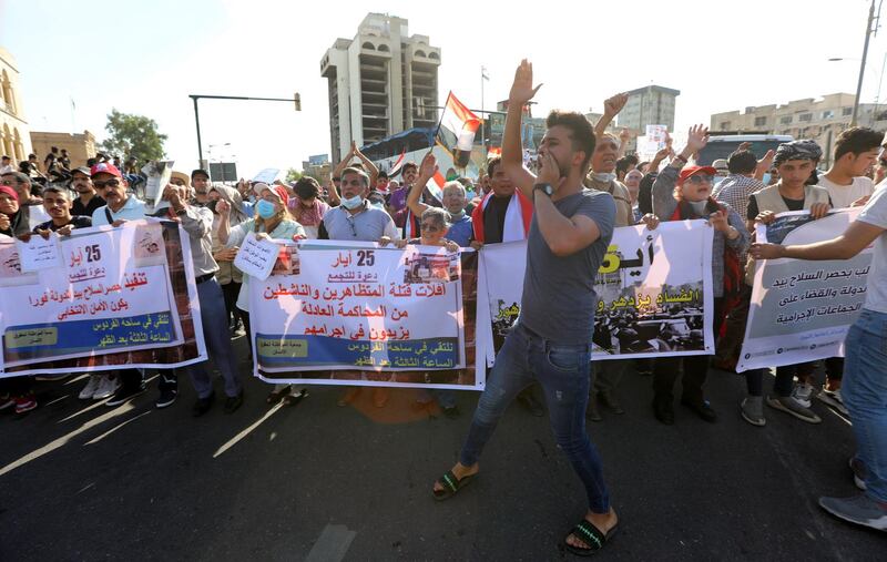 Protesters chant anti-government slogans in Baghdad's Tahrir Square. EPA