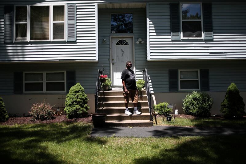 Michael Payne stands in front of his home in the Penn Estates development where most of the homeowners are underwater on their mortgages in East Stroudsburg, Pennsylvania, U.S., June 20, 2018. Picture taken June 20, 2018. REUTERS/Mike Segar