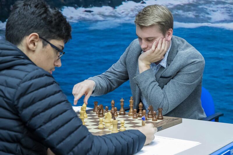 Alireza Firouzja from Iran playing against Vladislav Kovalev from Belarus during the first round of the 82st edition of the Tata Steel Chess Tournament. EPA