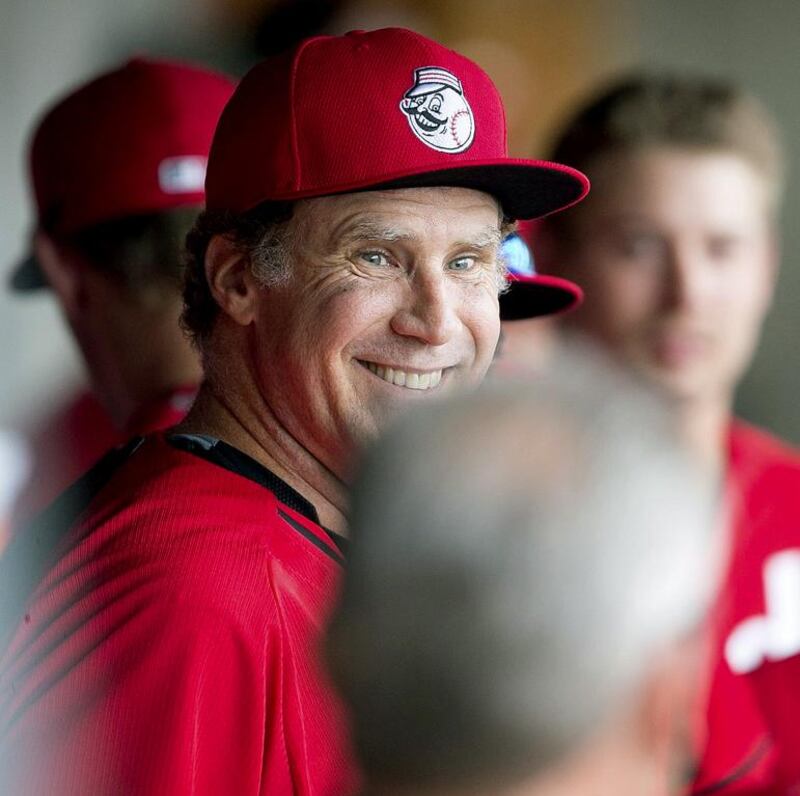 Actor Will Ferrell smiles in the dugout during a spring training baseball game between the Cincinnati Reds and the Arizona Diamondbacks on Thursday, March 12, 2015, in Scottsdale, Arizons. Ferrell made an appearance at third base for the Reds. AP 