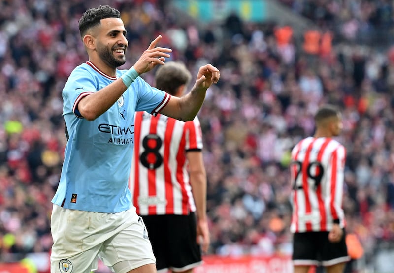 Manchester City's Riyad Mahrez celebrates scoring his third goal against Sheffield United in their FA Cup semi-final at Wembley. AFP