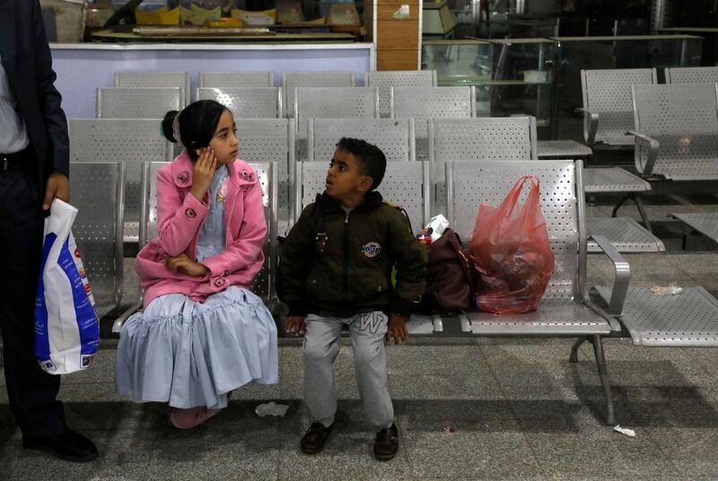 A Yemeni girl and boy wait in the departure lounge at Sanaa International airport, in Yemen. AP Photo