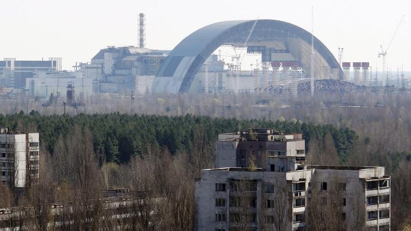 A protective shelter being mounted over the remains of the Chernobyl nuclear power plant in Ukraine. Oleksandr Lepetuha / EPA