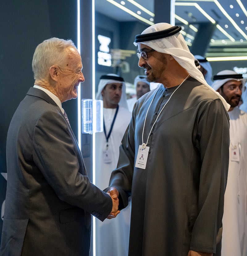 Sheikh Mohamed greets a guest during his tour