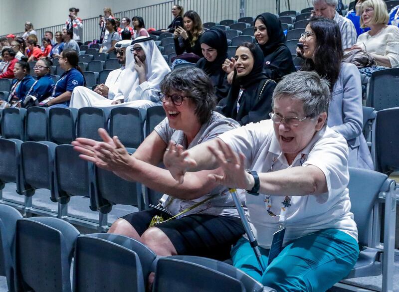 Abu Dhabi, March 17, 2019.  Special Olympics World Games Abu Dhabi 2019. FOR SHIREENA article:  (L-R) Claire Shires and Elspeth Cooper cheer for the gymnasts.
Victor Besa/The National