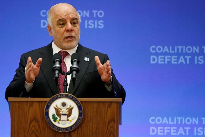 FILE PHOTO:Iraqi Prime Minister Haider al-Abadi delivers remarks at the morning ministerial plenary for the Global Coalition working to Defeat ISIS at the State Department in Washington, U.S., March 22, 2017. REUTERS/Joshua Roberts/File Photo