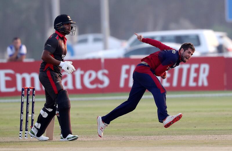 ABU DHABI , UNITED ARAB EMIRATES , October 22  – 2019 :- Charles Perchard of Jersey bowling during the World Cup T20 Qualifiers between UAE vs Jersey held at Tolerance Oval cricket ground in Abu Dhabi.  ( Pawan Singh / The National )  For Sports. Story by Paul