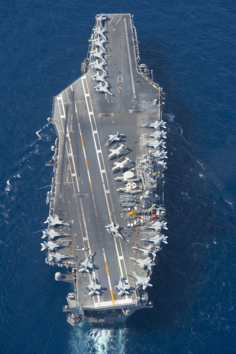 The USS George HW Bush transiting the Mediterranean Sea on February 21, 2017 while launching strikes on ISIL targets. Courtesy Mass Communication Specialist 3rd Class Daniel Gaither / US navy