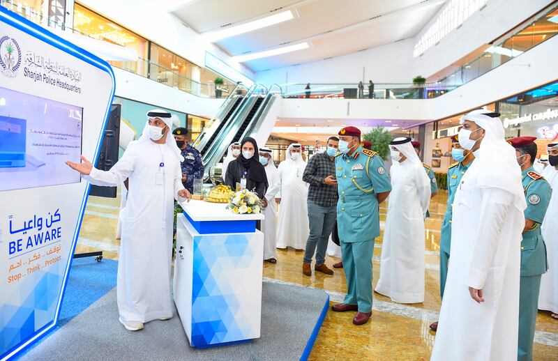The police have set up a booth at City Centre Al Zahia to advise people about the dangers of cybercrime. Photo: Sharjah Police