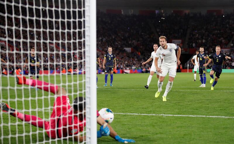 Kosovo's Aro Muric saves a penalty from England's Harry Kane. Reuters