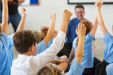 Children in Britain could have their school day extended, as well as lessons in summer, under new government plans for education. Getty