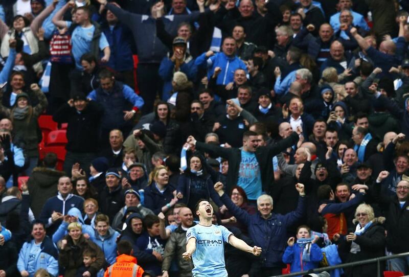 Manchester City's Samir Nasri celebrates after scoring a goal one minute after Toure in the League Cup final against Sunderland. Eddie Keogh / Reuters
