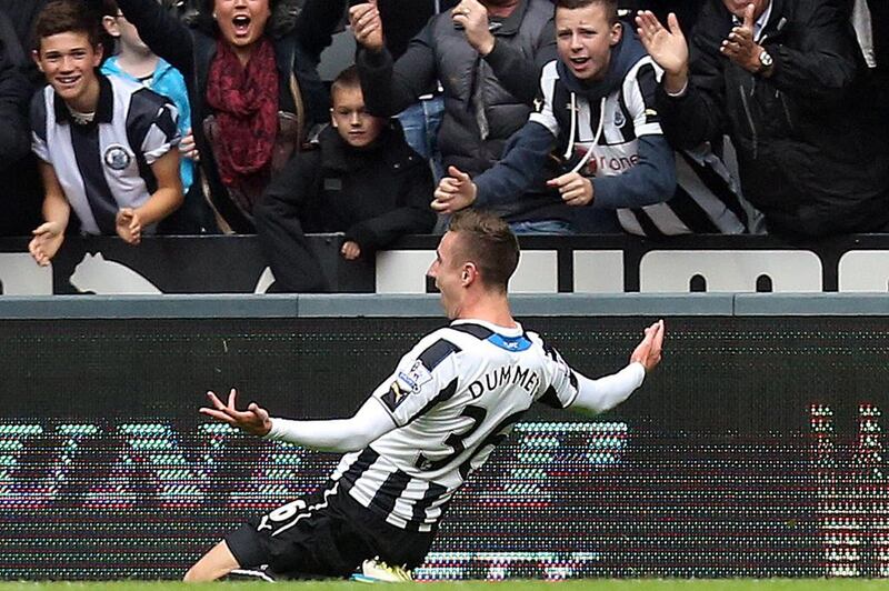 Centre-back Paul Dummett, previously an unknown, came off the bench to score and defend manfully for Newcastle against Liverpool. Scott Heppell / AP