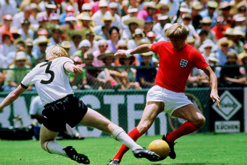 Football - 1970 FIFA World Cup - Quarter Final - West Germany v England - Estadio Guanajuato, Leon - 17/6/70 
Colin Bell - England being tackled by un named West German player 
Mandatory Credit: Action Images / Sporting Pictures  
CONTRACT CLIENTS PLEASE NOTE: ADDITIONAL FEES MAY APPLY - PLEASE CONTACT YOUR ACCOUNT MANAGER