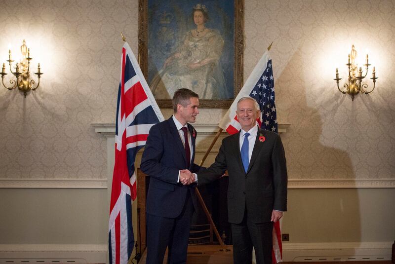 Gavin Williamson and US Defence Secretary James Mattis shake hands before a bilateral meeting at the Ministry of Defence in London in November 2017. Getty Images