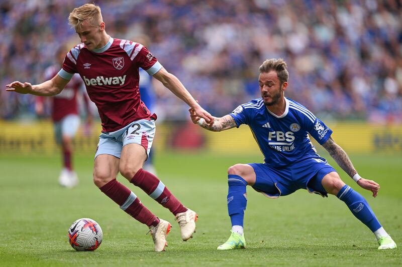 Flynn Downes of West Ham United battles for possession with James Maddison of Leicester City. Getty