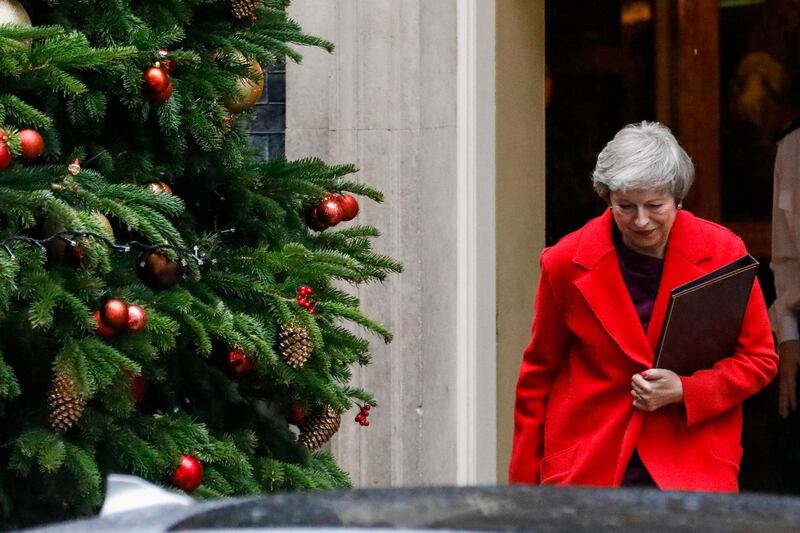 Theresa May, U.K. prime minister, leaves number 10 Downing Street in London, U.K., on Monday, Dec. 3, 2018. May faces yet another grueling battle this week as members of Parliament sink their teeth into her Brexit deal ahead of a crucial vote. Photographer: Luke MacGregor/Bloomberg