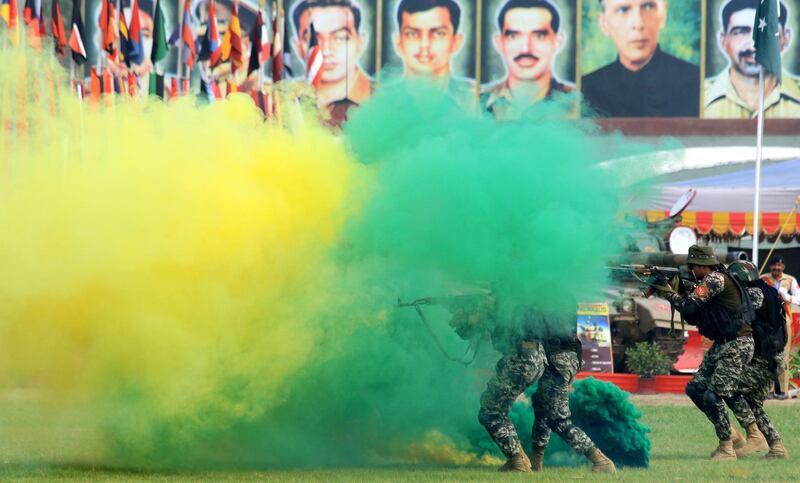 Pakistani soldiers show their skills during an event on the eve of the Defense Day in Peshawar, Pakistan.  EPA