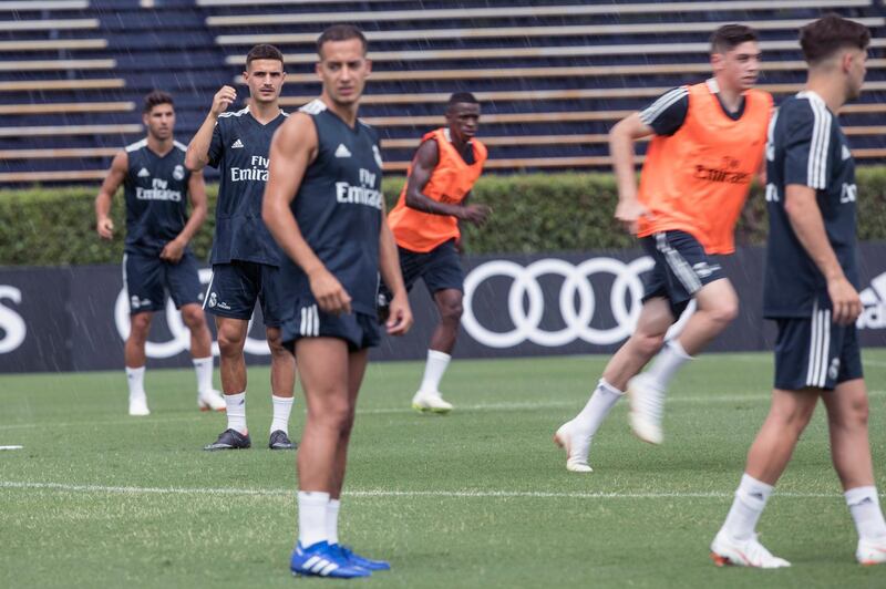 Real Madrid midfielder Jaime Seoane, second from left, trains at Florida International University. AP Photo