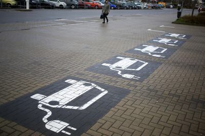 A row of electric vehicle parking spaces sit vacant near the Volkswagen AG (VW) headquarters in Wolfsburg, Germany, on Thursday, March 12, 2020. The outlook is darkening for everyone from market leader Volkswagen AG to Tesla Inc. and smaller local contenders that were already battling an unprecedented slump before the coronavirus outbreak. Photographer: Krisztian Bocsi/Bloomberg