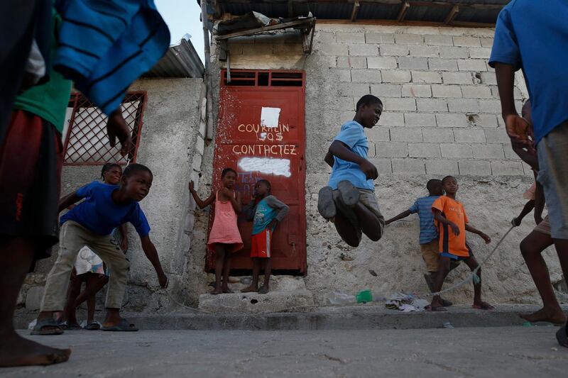 Kids jump rope in the Cite Soleil district of Port-au-Prince, Haiti. AP Photo