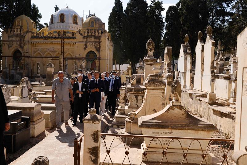 President Macron during the visit to the European Saint-Eugene cemetery in Algiers. AFP
