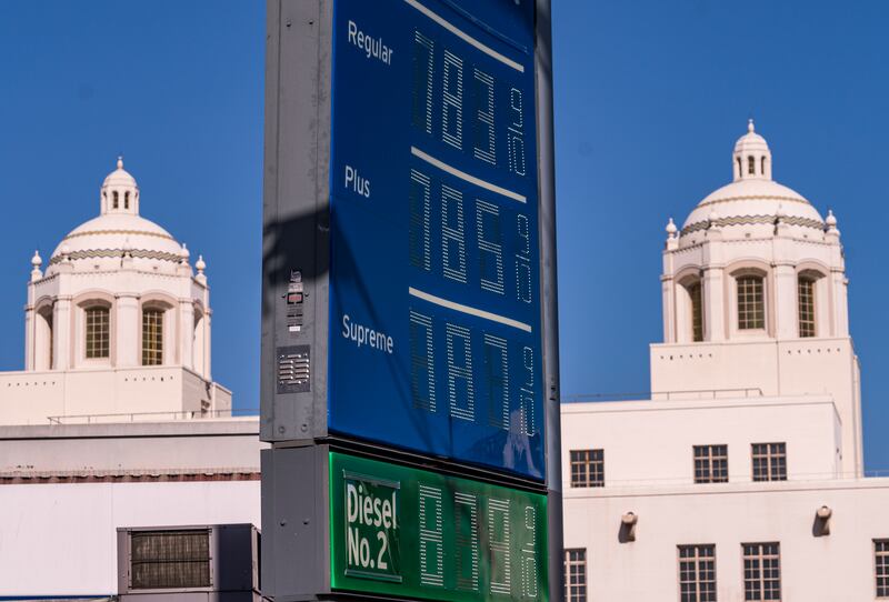 Various grades of petrol, with prices above $7 per gallon, are displayed at a Chevron gas station in central Los Angeles, California. AP