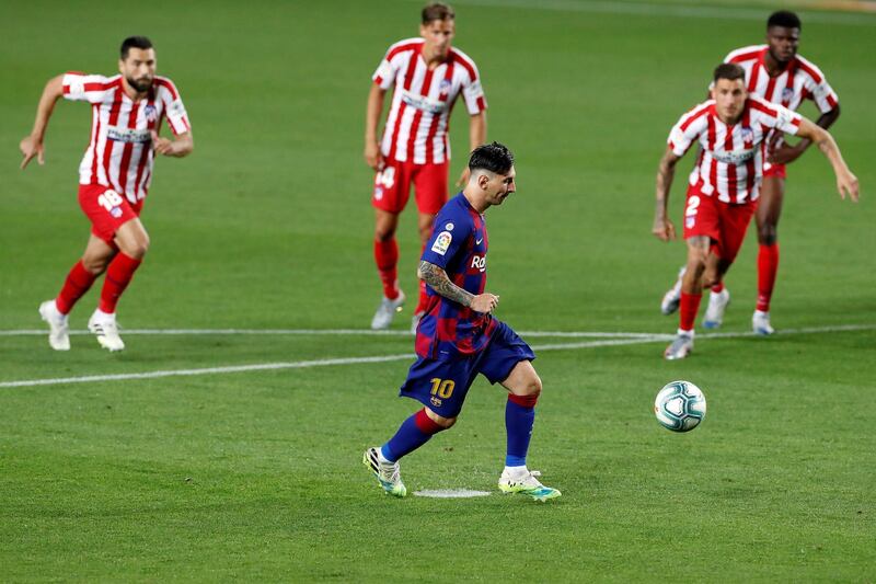 Lionel Messi converts his Panenka penalty. EPA