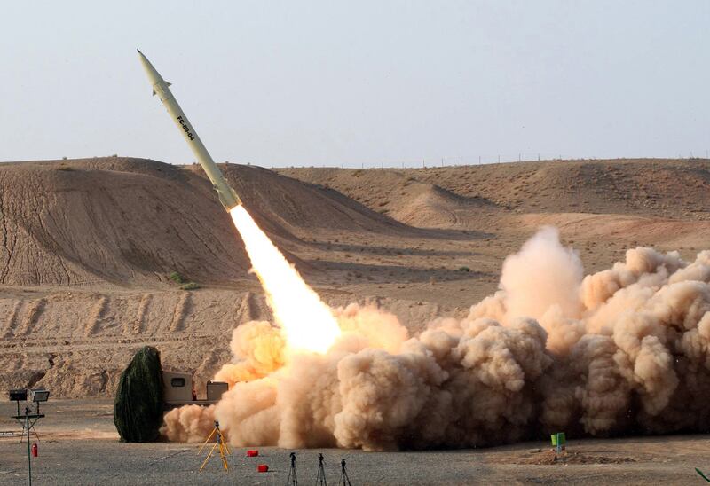 The Iranian Defence Ministry allegedly test fires its home-built surface-to-surface Fateh 110 missile in 2010. Tehran has developed a wide range of sophisticated missiles. AFP