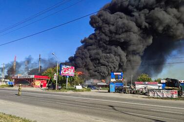 The fire at a petrol station near the Russian city of Novosibirsk left 33 people injured. EPA