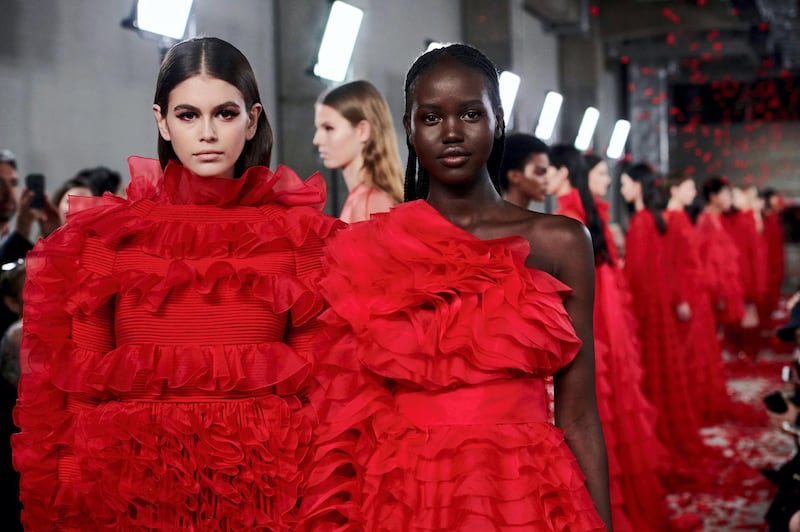 Red was also the shade of choice for the last two looks, presented by models Kaia Gerber and Adut Akech