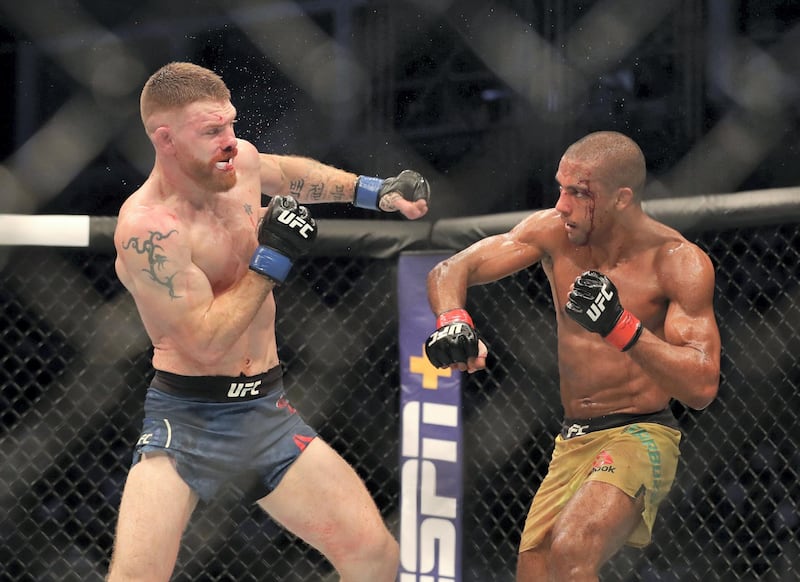 Abu Dhabi, United Arab Emirates - September 07, 2019: Lightweight bout between Edson Barboza and Paul Felder (blue shorts, winner) in the Main card at UFC 242. Saturday the 7th of September 2019. Yas Island, Abu Dhabi. Chris Whiteoak / The National