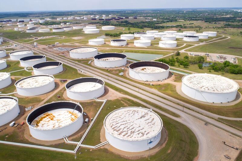 FILE PHOTO: Crude oil storage tanks are seen in an aerial photograph at the Cushing oil hub in Cushing, Oklahoma, U.S. April 21, 2020. REUTERS/Drone Base/File Photo