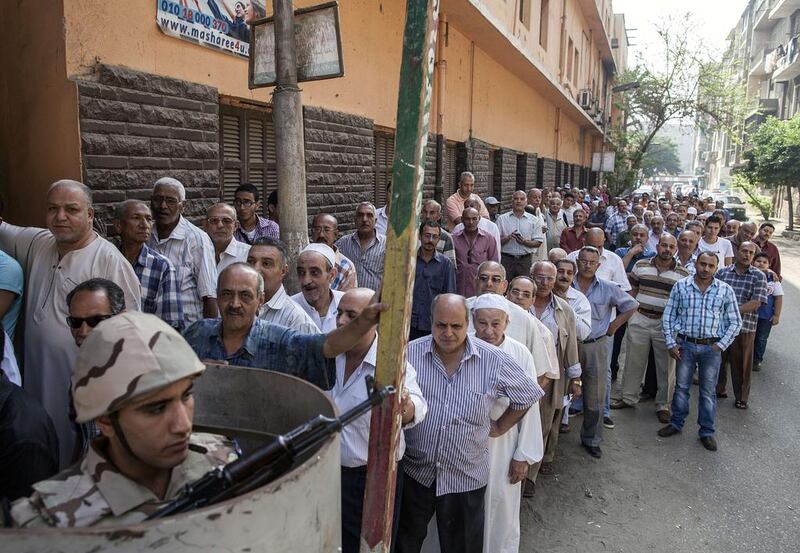 Many view the vote as a referendum on stability versus the freedoms promised by the Arab Spring-inspired popular uprising that ousted veteran strongman Hosni Mubarak in 2011. Mahmoud Khaled/AFP Photo