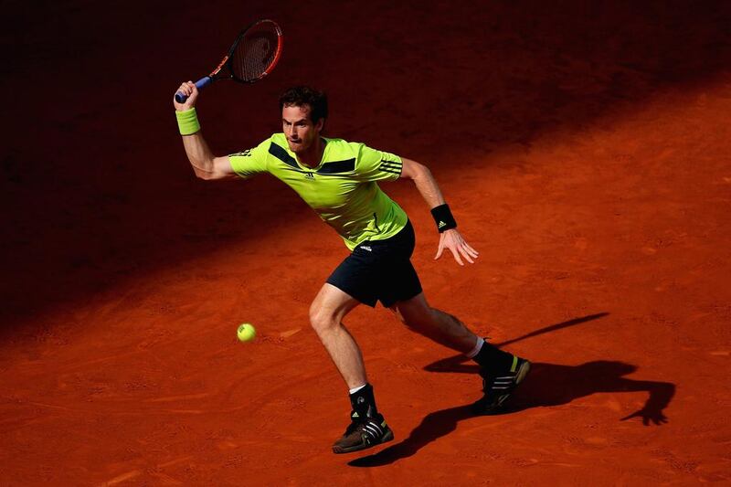 Andy Murray of Great Britain stretches for a shot during his match against Santiago Giraldo of Colombia at the Mutua Madrid Open on May 8, 2014, in Madrid, Spain. Julian Finney / Getty Images