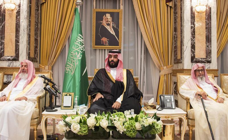 A handout photo made available by the Saudi press Agency (SPA) late on June 21, 2017, shows Saudi Crown Prince Mohammed bin Salman sitting as royal family members and other official pledge allegiance to him, at the Royal Palace in Mecca. - Saudi Arabia's King Salman ousted his nephew as crown prince and installed his son Mohammed bin Salman, capping a meteoric rise for the 31-year-old that puts him one step from the throne. (Photo by Handout / SPA / AFP) / RESTRICTED TO EDITORIAL USE - MANDATORY CREDIT "AFP PHOTO / BANDAR AL-JALOUD/ SPAE" - NO MARKETING NO ADVERTISING CAMPAIGNS - DISTRIBUTED AS A SERVICE TO CLIENTS