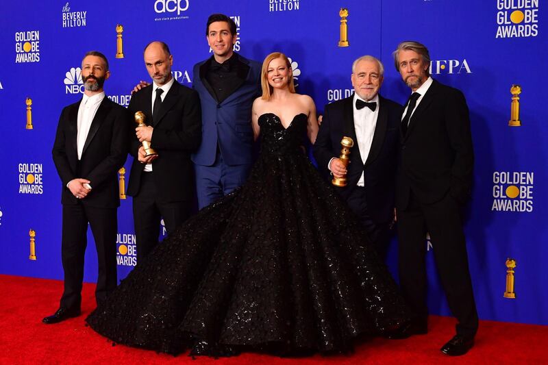 The cast of 'Succession' pose with their Best Television Series - Drama award, during the 77th annual Golden Globe Awards on January 5, 2020, at The Beverly Hilton hotel in Beverly Hills, California. AFP