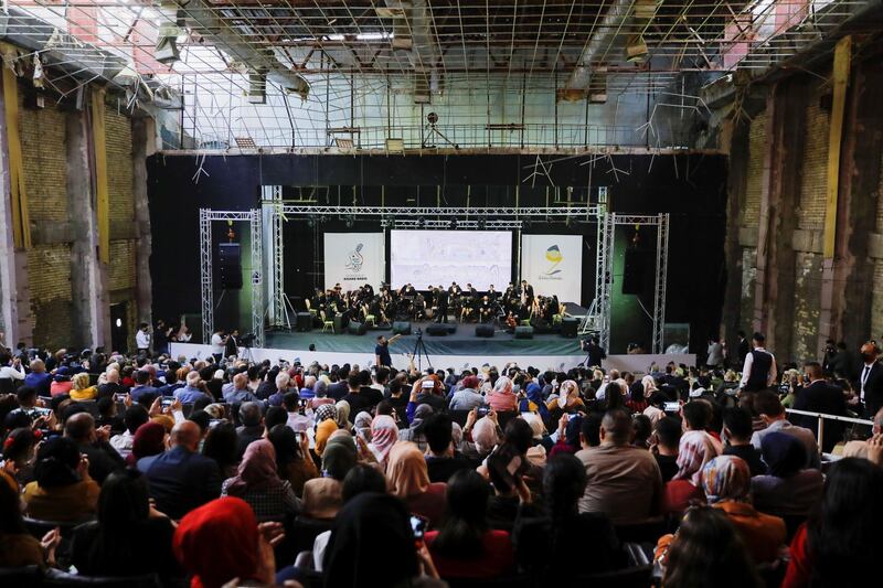 A packed audience watches the inaugural performance at the restored Al Rabea Theatre in Mosul, Iraq. Reuters